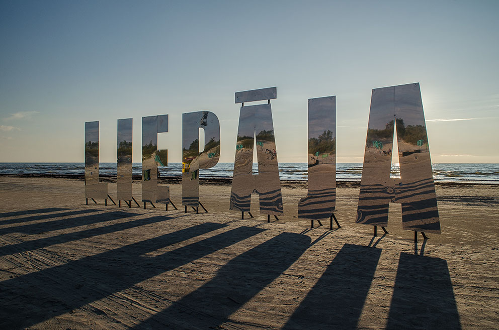 Liepaja-city-title-at-Baltic-beach.-Big-mirroring-letters-in-sunny-evening-1322666976_4898x3244.jpg